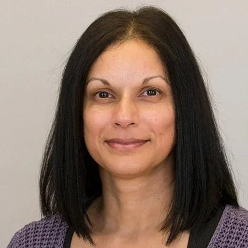 irene dacosta profile on a light gray background