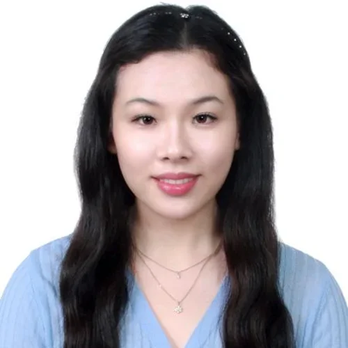 minji kim wearing a light blue shirt on a white background