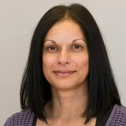 irene dacosta profile on a light gray background