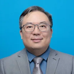 darryl hwang phd profile on light blue background