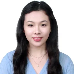 minji kim wearing a light blue shirt on a white background
